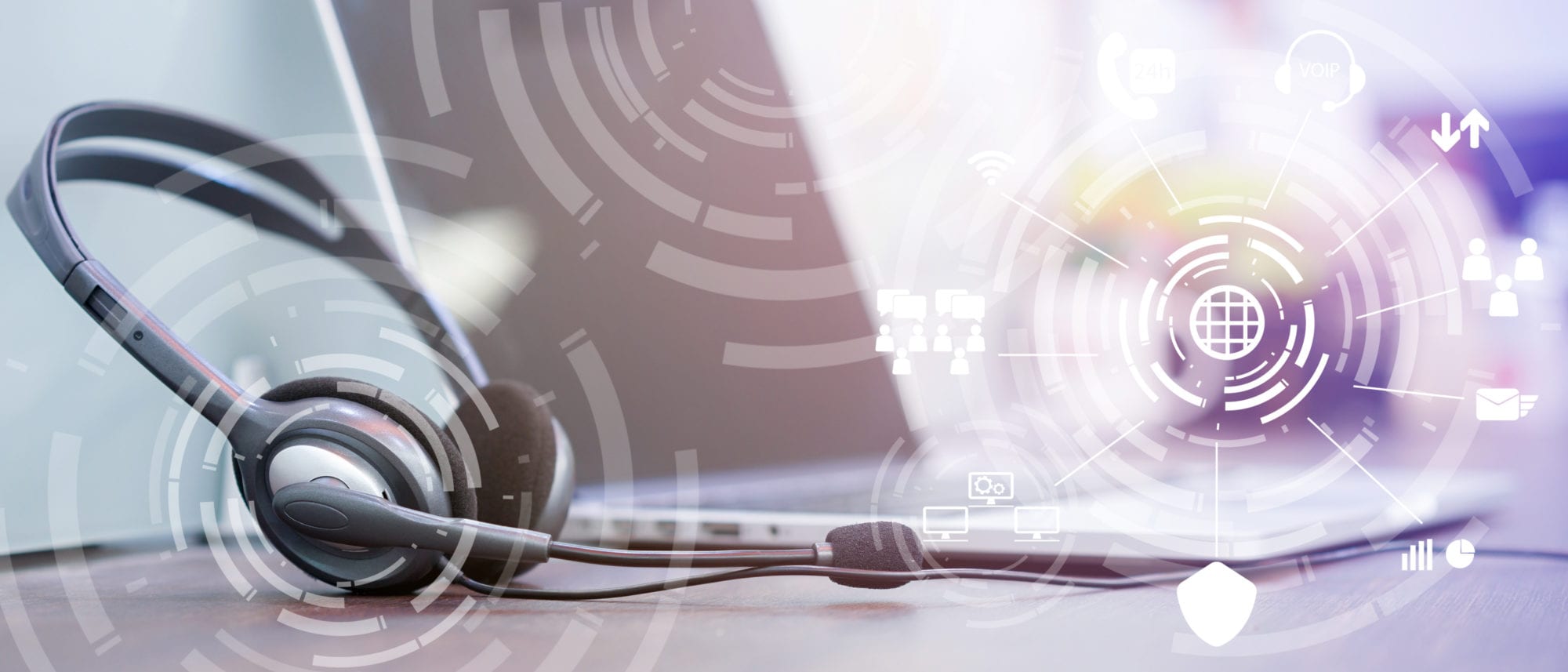 a call center headset on a desk with analytics on top